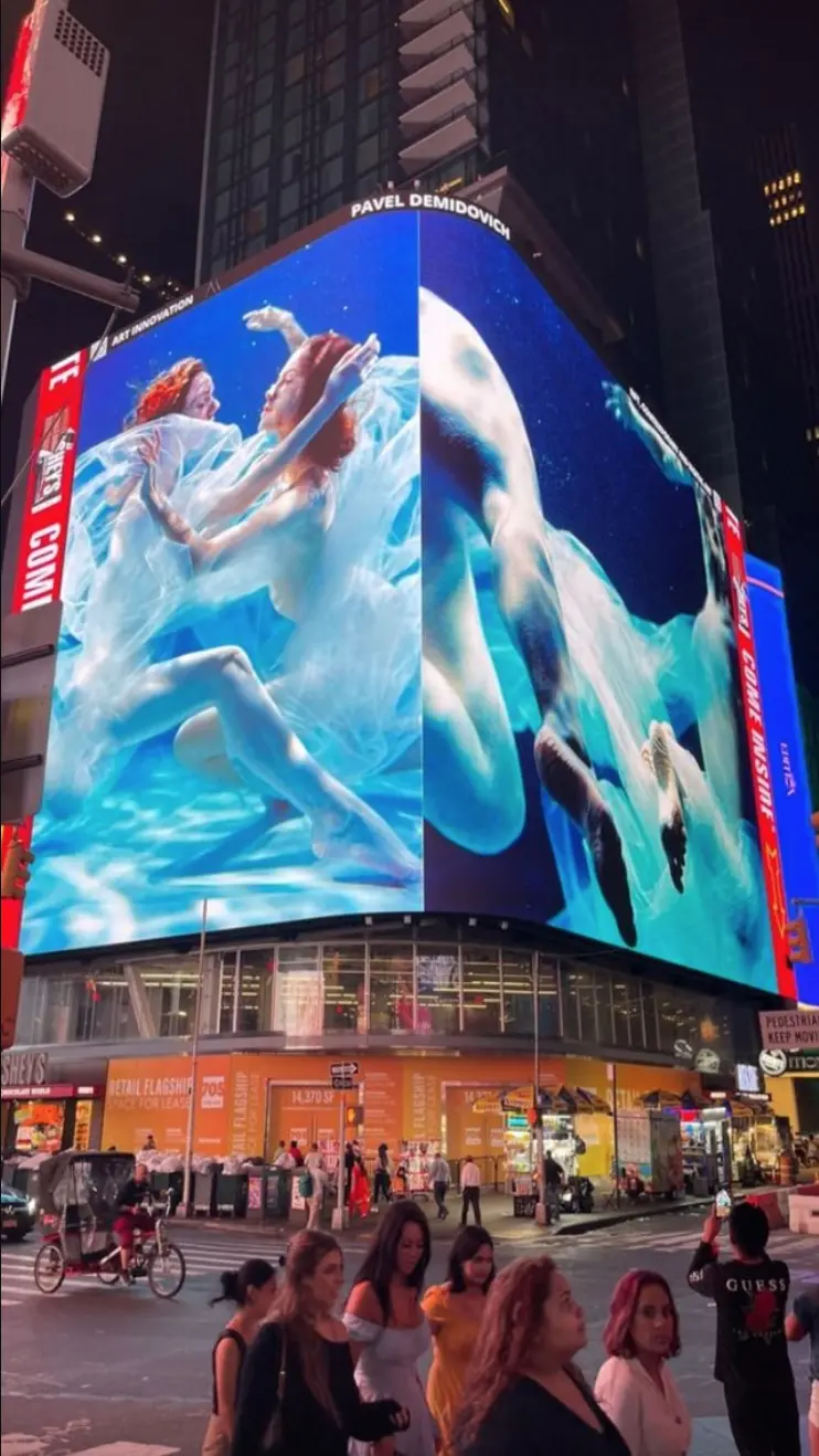 Times Square exhibition display at night, New York